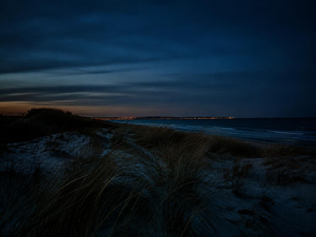 Placeholder — coastal evening light over dunes